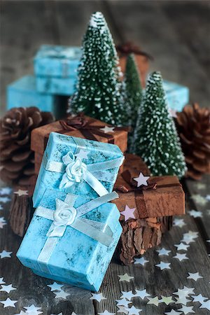 simsearch:400-07824858,k - Gift boxes with christmas decoration on wooden table Stock Photo - Budget Royalty-Free & Subscription, Code: 400-08788009