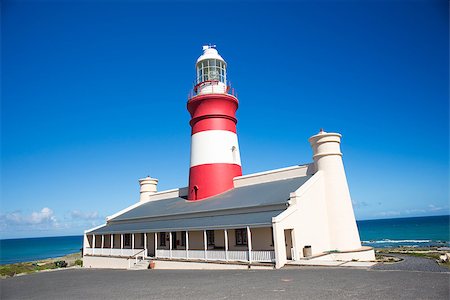 The Cape Agulhas lighouse at the most southern point in Africa. Photographie de stock - Aubaine LD & Abonnement, Code: 400-08788025