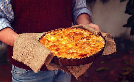 Homemade american apple pie in the man hands. Outdoor. Thanksgiving. Stock Photo - Budget Royalty-Free & Subscription, Code: 400-08789633