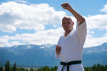 rammellzee (artist) - Man in white kimono and black belt training karate on mountain background. Altay, Russia. Stock Photo - Budget Royalty-Free & Subscription, Code: 400-08795436