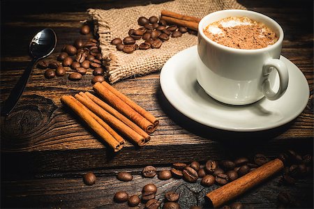 phantom1311 (artist) - cinnamon cup of coffee and grain on a wooden background Stock Photo - Budget Royalty-Free & Subscription, Code: 400-08795458