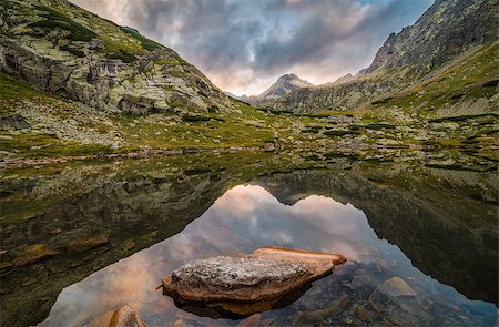 Mountain Lake Above Skok Waterfall with Rocks in Foreground and Strbsky Peak in Background at Sunset. Mlynicka Valley, High Tatra, Slovakia. Photographie de stock - Aubaine LD & Abonnement, Code: 400-08795816