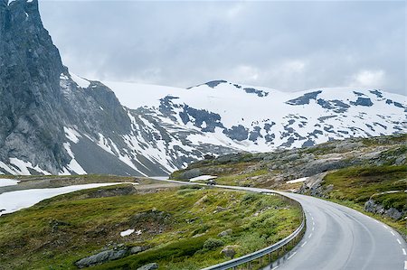 steffus (artist) - Mountain road at Dalsnibba plateau and snowy peaks ahead. Geiranger, Norway Fotografie stock - Microstock e Abbonamento, Codice: 400-08796544