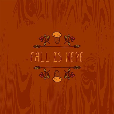 simsearch:400-08793659,k - Hand-sketched typographic element with mushroom, berries and text on wooden background. Fall is here Stock Photo - Budget Royalty-Free & Subscription, Code: 400-08790823