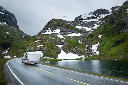 steffus (artist) - Scenic norwegian road in the mountains with car and camper. Norway. Fotografie stock - Microstock e Abbonamento, Codice: 400-08791527