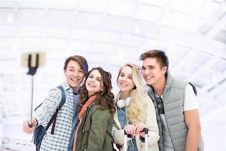 Youth makes selfie at the airport Stock Photo - Budget Royalty-Free & Subscription, Code: 400-08792688