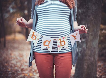 simsearch:400-07546212,k - Beautiful pregnant woman with a big belly on outdoors Stock Photo - Budget Royalty-Free & Subscription, Code: 400-08793470