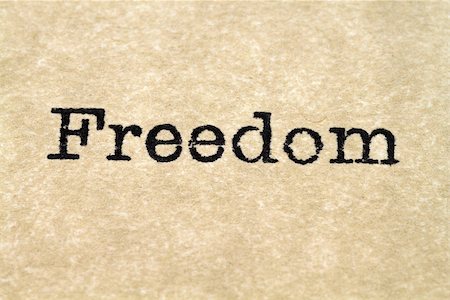 simsearch:400-08078286,k - A close up image of the word "freedom" from a typewriter Foto de stock - Super Valor sin royalties y Suscripción, Código: 400-08805999