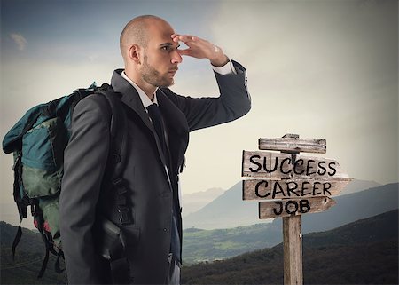 simsearch:400-07892835,k - Businessman with explorer backpack follows the directional arrows Stock Photo - Budget Royalty-Free & Subscription, Code: 400-08806650