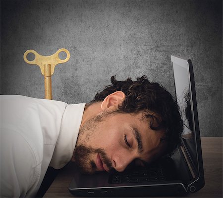 discharge - Businessman exhausted from overwork sleeping over computer Stock Photo - Budget Royalty-Free & Subscription, Code: 400-08806663