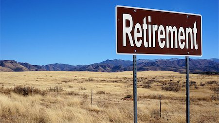 simsearch:400-08033801,k - Retirement road sign with blue sky and wilderness Stock Photo - Budget Royalty-Free & Subscription, Code: 400-08807255