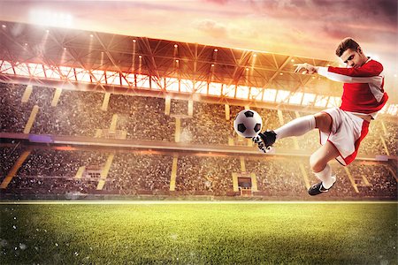 simsearch:400-04273920,k - Football player play in a stadium with audience Foto de stock - Royalty-Free Super Valor e Assinatura, Número: 400-08807861