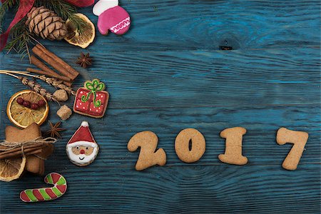 simsearch:400-08131561,k - Gingerbreads for new 2017 year on wooden background, xmas theme Stockbilder - Microstock & Abonnement, Bildnummer: 400-08809071