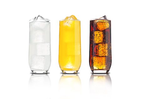 simsearch:400-08815499,k - Glasses of orange soda, cola and lemonade with ice cubes and bubbles with reflection on white background Foto de stock - Royalty-Free Super Valor e Assinatura, Número: 400-08809578