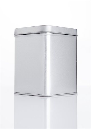 Emty tea steel container jar on white background with reflection Foto de stock - Royalty-Free Super Valor e Assinatura, Número: 400-08809579