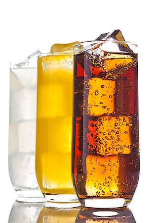 simsearch:400-03911442,k - Glasses with cola orange soda and lemonade with ice cubes and reflection on white background Stockbilder - Microstock & Abonnement, Bildnummer: 400-08809572