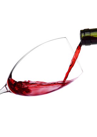 simsearch:400-08809600,k - Pouring red wine from bottle to glass isolated on white background Stock Photo - Budget Royalty-Free & Subscription, Code: 400-08809585