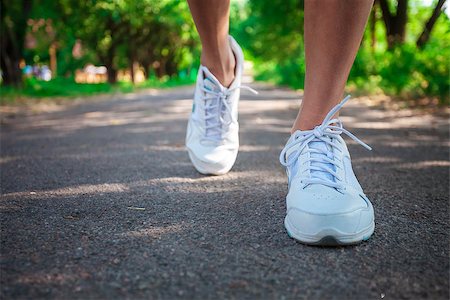 feet marathon - Cropped view of woman athlete running on pathway in park Stock Photo - Budget Royalty-Free & Subscription, Code: 400-08814281