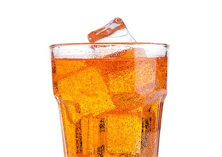 soda - Glass of orange energy soda drink with ice on white background Stockbilder - Microstock & Abonnement, Bildnummer: 400-08815497