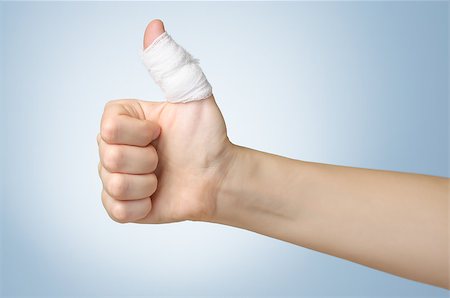 simsearch:400-07669067,k - Injured painful finger with white bandage Fotografie stock - Microstock e Abbonamento, Codice: 400-08817768