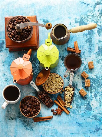 Still life of coffee - green and brown beans and spices, cinnamon and anise Stock Photo - Budget Royalty-Free & Subscription, Code: 400-08818340