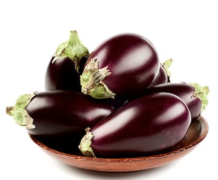 simsearch:400-06857433,k - Arrangement of Raw Small Eggplants In Bowl isolated on White background. Focus on Foreground Foto de stock - Super Valor sin royalties y Suscripción, Código: 400-08810811