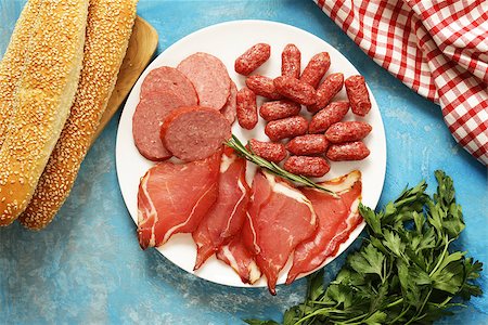 platter with cold meat - Assorted deli meats -  sausage, salami, parma, prosciutto Stock Photo - Budget Royalty-Free & Subscription, Code: 400-08811108