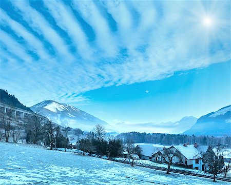 simsearch:400-08817566,k - Winter mountain sunshiny village hazy landscape (Austria). Photographie de stock - Aubaine LD & Abonnement, Code: 400-08811468