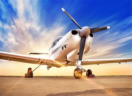 simsearch:400-08864596,k - picture of a sports plane against a sunset Stock Photo - Budget Royalty-Free & Subscription, Code: 400-08811476