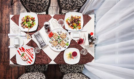 sushi dessert - Table at restraurant served for four people Stock Photo - Budget Royalty-Free & Subscription, Code: 400-08811932