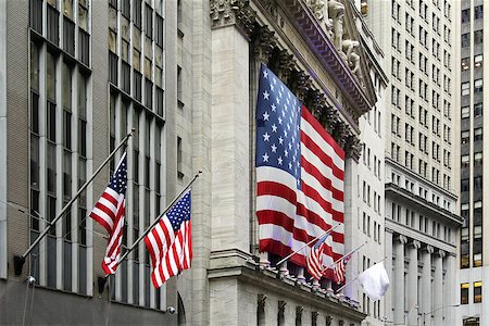 Wall Street with New York Stock Exchange in Manhattan Finance district during United States economy recovery in Manhattan. New York City. Stock Photo - Budget Royalty-Free & Subscription, Code: 400-08812793