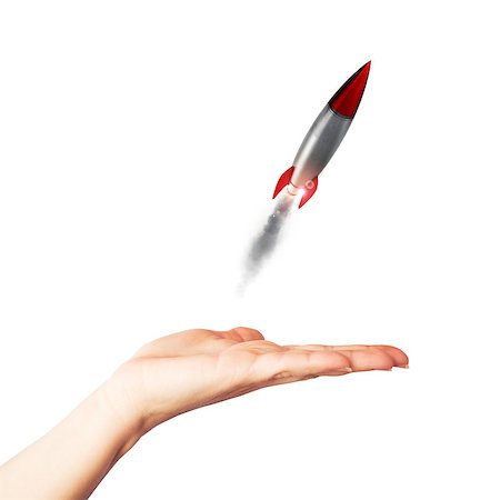 simsearch:400-09112433,k - Businesswoman holding a small rocket. Startup working enterprise concept Stockbilder - Microstock & Abonnement, Bildnummer: 400-08834249