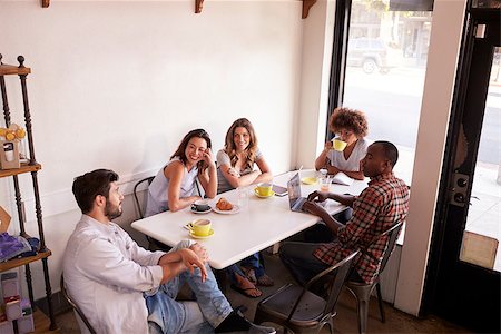 simsearch:400-08892368,k - Five adult friends sitting in a cafe, elevated view Stock Photo - Budget Royalty-Free & Subscription, Code: 400-08838030