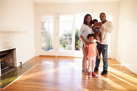simsearch:400-09122233,k - Portrait Of Family In New Home On Moving Day Stock Photo - Budget Royalty-Free & Subscription, Code: 400-08838288