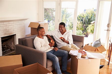 simsearch:400-08938320,k - Father And Adult Son Take A Break With Pizza On Moving Day Stock Photo - Budget Royalty-Free & Subscription, Code: 400-08838280