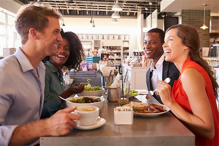 simsearch:400-08292251,k - Group Enjoying Business Lunch In Delicatessen Stock Photo - Budget Royalty-Free & Subscription, Code: 400-08838484