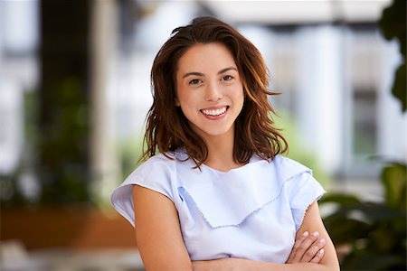 filipina businesswoman - Close up of young mixed race businesswoman looking at camera Stock Photo - Budget Royalty-Free & Subscription, Code: 400-08838770