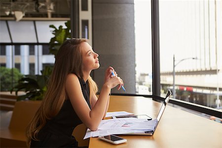 simsearch:400-08838924,k - Businesswoman working in an office looking out of the window Stock Photo - Budget Royalty-Free & Subscription, Code: 400-08838817