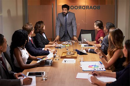 simsearch:400-08838924,k - Businessman addressing colleagues at a boardroom meeting Stock Photo - Budget Royalty-Free & Subscription, Code: 400-08838847