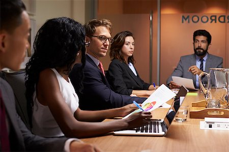 simsearch:400-08838985,k - Business people at an evening boardroom meeting, close up Stock Photo - Budget Royalty-Free & Subscription, Code: 400-08838843