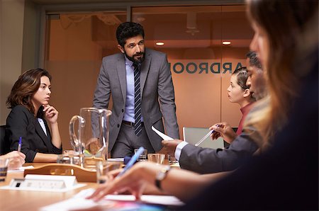 simsearch:400-08838985,k - Businessman addressing team at a meeting, low angle close up Stock Photo - Budget Royalty-Free & Subscription, Code: 400-08838855