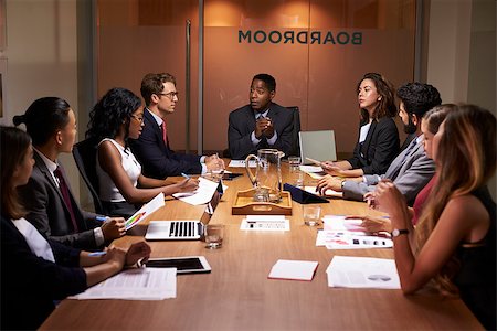 simsearch:400-08838985,k - Corporate business people at an evening boardroom meeting Stock Photo - Budget Royalty-Free & Subscription, Code: 400-08838858