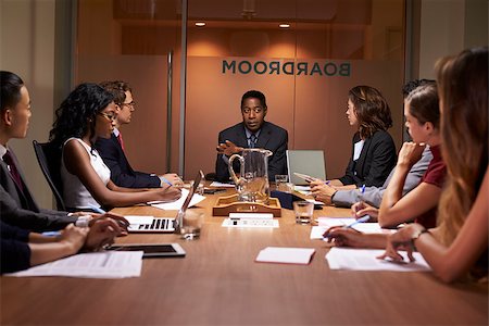 simsearch:400-08838985,k - Corporate business people at an evening boardroom meeting Stock Photo - Budget Royalty-Free & Subscription, Code: 400-08838859