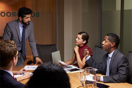 simsearch:400-08838985,k - Businessman addressing colleagues at a meeting, close up Stock Photo - Budget Royalty-Free & Subscription, Code: 400-08838850
