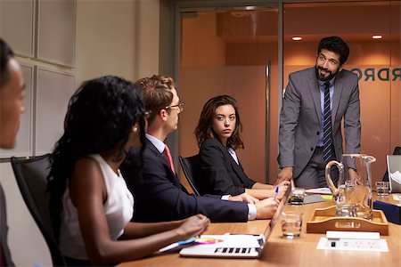 simsearch:400-08838985,k - Businessman addressing colleagues at a meeting, close up Stock Photo - Budget Royalty-Free & Subscription, Code: 400-08838852