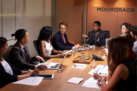 simsearch:400-08838985,k - Businessman addressing corporate colleagues at a meeting Stock Photo - Budget Royalty-Free & Subscription, Code: 400-08838860