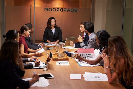 simsearch:400-08838985,k - Female boss chairing a business meeting in a boardroom Stock Photo - Budget Royalty-Free & Subscription, Code: 400-08838875