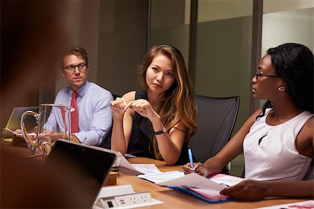 simsearch:400-08838985,k - Business colleagues at a meeting in boardroom, close up Stock Photo - Budget Royalty-Free & Subscription, Code: 400-08838889