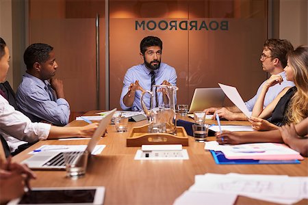 simsearch:400-08838985,k - Business people listening to manager at a meeting, close up Stock Photo - Budget Royalty-Free & Subscription, Code: 400-08838895