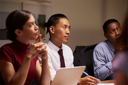 simsearch:400-08838985,k - Business colleagues listening at evening meeting, close up Stock Photo - Budget Royalty-Free & Subscription, Code: 400-08838890